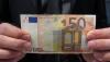 Businessman Shows 50 Euro Note preview image.jpg